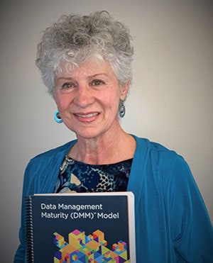 Photo of Melanie Mecca with the Data Management Maturity Model